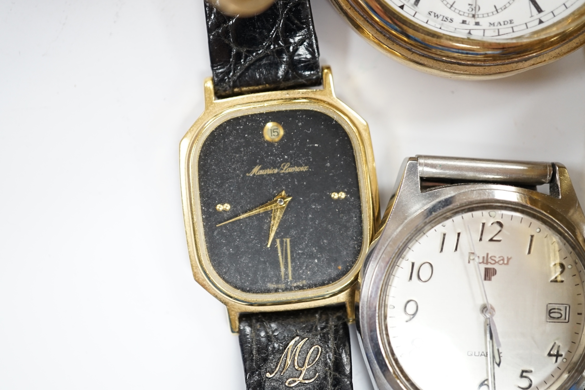 A small group of assorted wrist and pocket watches including a gold plated hunter and a Roamer Searock.